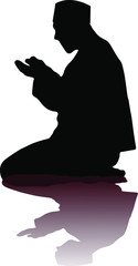 silhouette of a muslim man are praying
