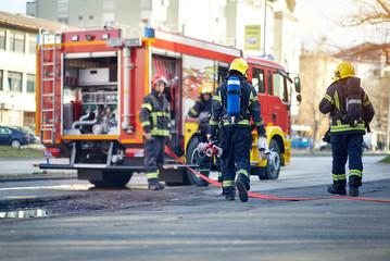 firefighter teamwork successfully completed the firefighting