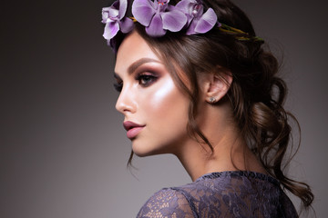 Naklejka premium Beautiful Girl with Flowers. Pastel Colors. Perfect Face Skin