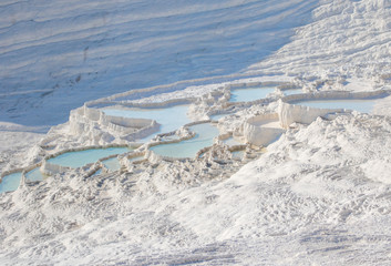 Pamukkale, Turkey - one of the most famous attractions of Turkey, and a Unesco World Heritage site, Pamukkale is visited by millions each year. Here in particular the white travertine terraces