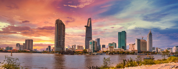 Saigon skyline and the Saigon River with Bitexco tower. Ho Chi Minh City is a popular tourist destination of Vietnam.