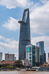 Saigon skyline and the Saigon River with Bitexco tower. Ho Chi Minh City is a popular tourist destination of Vietnam.