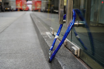 Chain loop is locking an entrance to a store.