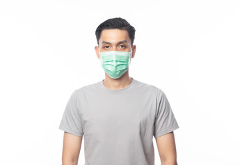 Young Asian Man wearing hygienic mask to prevent infection, 2019-nCoV or coronavirus. Airborne...