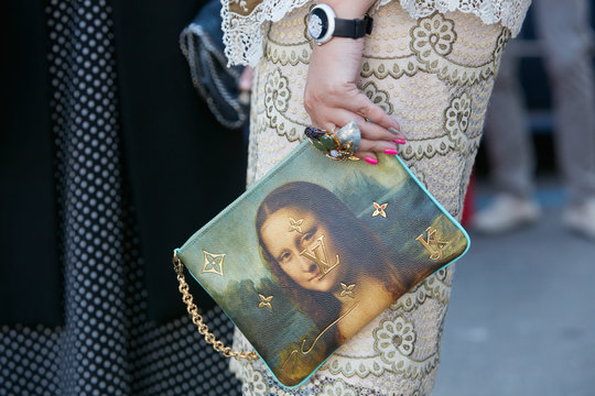 Woman with Louis Vuitton bag with Mona Lisa design on September 21, 2017 in Milan, Italy