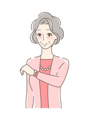 腕時計を見る女性