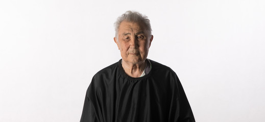 portrait of a man hairdresser on a white background
