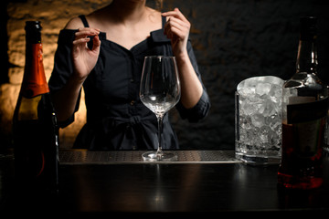 empty clean glass stands on bar counter.