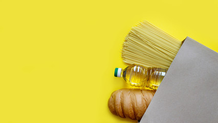 Crisis stock of food products for the period of quarantine isolation. Loaf of bread, pasta,...