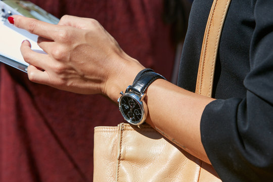 Woman with IWC Portofino Cronograph watch with black crocodile leather strap on September 20, 2017 in Milan, Italy