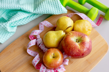 Fruits for health, Fresh Fruits, fitness fruit, red apples and yellow pears. A symbole of healthy nutrition. Top view