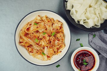 Homemade Rice noodles in chilli oil, selective focus