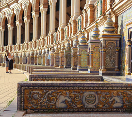 Tiles and decorations in the beautiful Plaza de Espana in Seville. Andalusia, Spain.