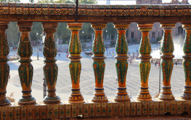 Sevilla - Details of colored little columns in Spain square in a sunny day 