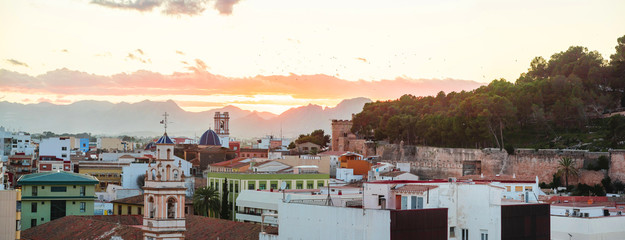 Obraz premium Panoramic view of mediterranean castle city and old town of Denia