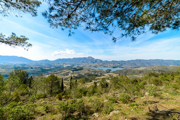 Fototapeta na wymiar Fantastic mountain in the nature reserve of Spain and the dam reservoir