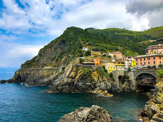 Fototapeta na wymiar Beautiful scenic view of Mediterranean sea and fishing villages, visible from the hiking Cinque Terre trail from Vernazza to Monterosso al Mare in Italy, Europe.