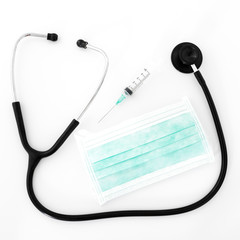 Stethoscope, syringe and mask