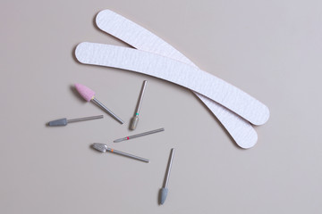 Set of professional manicure tools. Set of nail files Isolated on a gray background. Manicure and pedicure tools. Cosmetic products for manicurists.