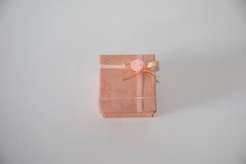 Gift box with ribbon on white background