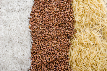 buckwheat, rice and pasta for background.