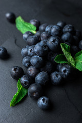 Blueberries on black background