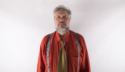 closeup portrait of an old man on a white background