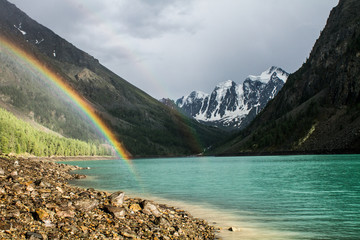 mountain lake in Altai with reinbow