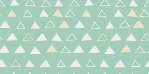 Seamless hand drawn geometric triangles in vector illustration. Yellow teal pastel colors cute simple design for scrapbooking wallpaper textile craft paper. Muted illustration colors for aesthetic.