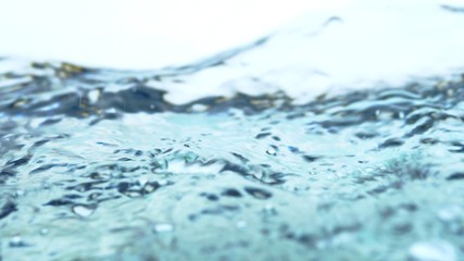 Soft blur focus of Abstract water splash surface filling the frame with the water drop and waving...