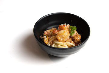 Spaghetti Seafood in a Black Cup, White Background