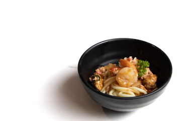 Spaghetti Seafood in a Black Cup, White Background