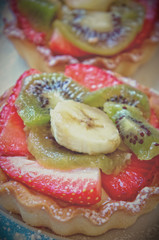 Fresh tarts with mixed fruits