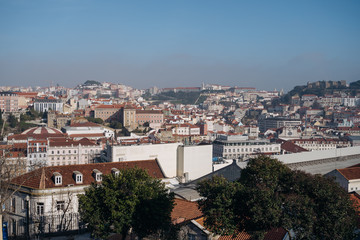 Fototapeta na wymiar Beautiful cityscape panorama. Top view on the old town in Lisbon city, Portugal
