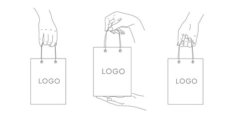 Set of simple line illustrations of hands holding shopping bags, different view and hand position, isolated