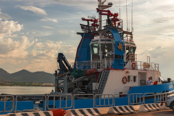 Tugboat anchored at the port of Olbia in Sardinia, Italy