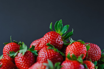 Vegetables and fruits in one color, background from freshly harvested strawberries, Fresh strawberry background,