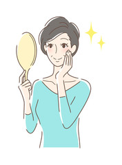 笑顔で手鏡を見る女性