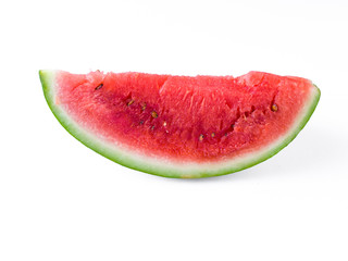 Sliced Watermelon on white plate with spoon and fork stock photo with bright background.
