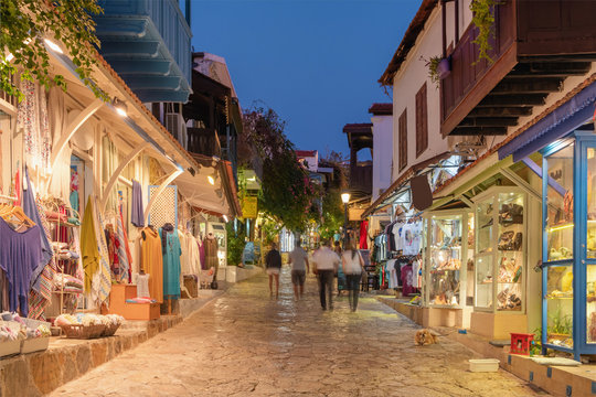 Street view in the Kas old town with boutique shops at evening, Turkey