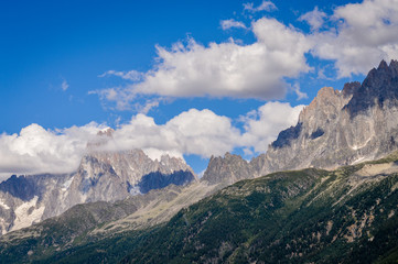 French Alps mountains in a cloudy summer day, seen from Les Houches near Chamonix, Haute Savoy, France.