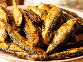 Fried herring on a plate
