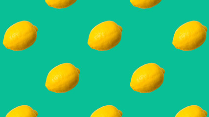 Seamless Pattern made with lemon fruit on aqua color background.