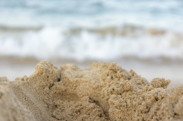 Sea surf, waves rolls on a sandy beach