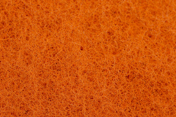 Close-Up Of orange Cleaning Sponge