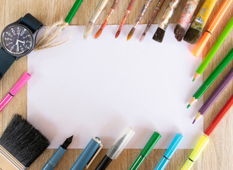 Visual art equipment is on the table covered with white cloth, Art Education, Learning to the 21st century, Stem studies.Selectively focus on specific points and blur in the image.