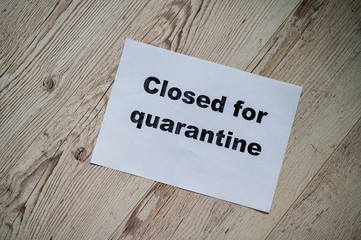 A note on the door. Quarantined. Coronavirus epidemic. Pandemic of the 21st century.