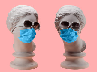 Head Of Aphrodite In Medical Mask. Concept Of Coronavirus Quarantine.