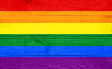 Gay pride flag painted on wooden pad