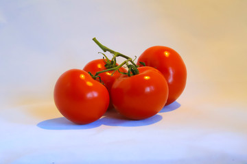 ripe red cluster of tomatoes